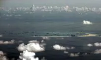 US Warships Sail in Disputed South China Sea, Angering China