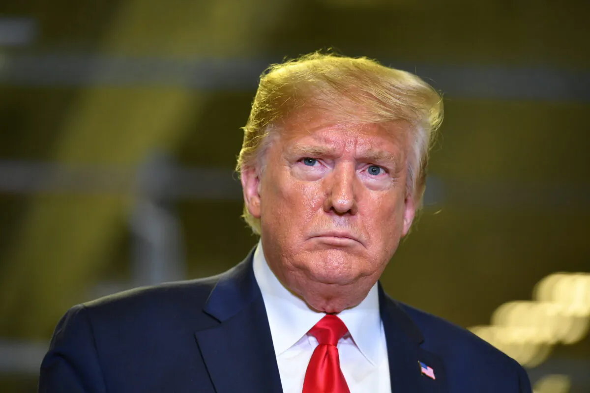 President Donald Trump speaks about the impeachment inquiry during a tour of the Flextronics computer manufacturing facility where Apple's Mac Pros are assembled in Austin, Texas, on Nov. 20, 2019. (Mandel Ngan/AFP via Getty Images)