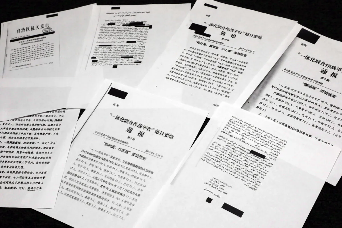 A sample of classified Chinese government documents leaked to a consortium of news organizations, is displayed for a picture in New York, on Nov. 22, 2019. Beijing has detained more than a million Uyghurs, ethnic Kazakhs and other Muslim minorities for what it calls voluntary job training. (Richard Drew/AP)
