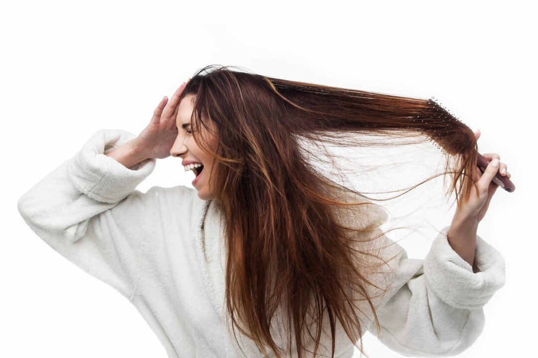 Someone with severe skin sensitivity from migraines will experience excessive pain from simple acts like brushing their hair, rubbing their head and even wearing jewelry.(Remita/Shutterstock)