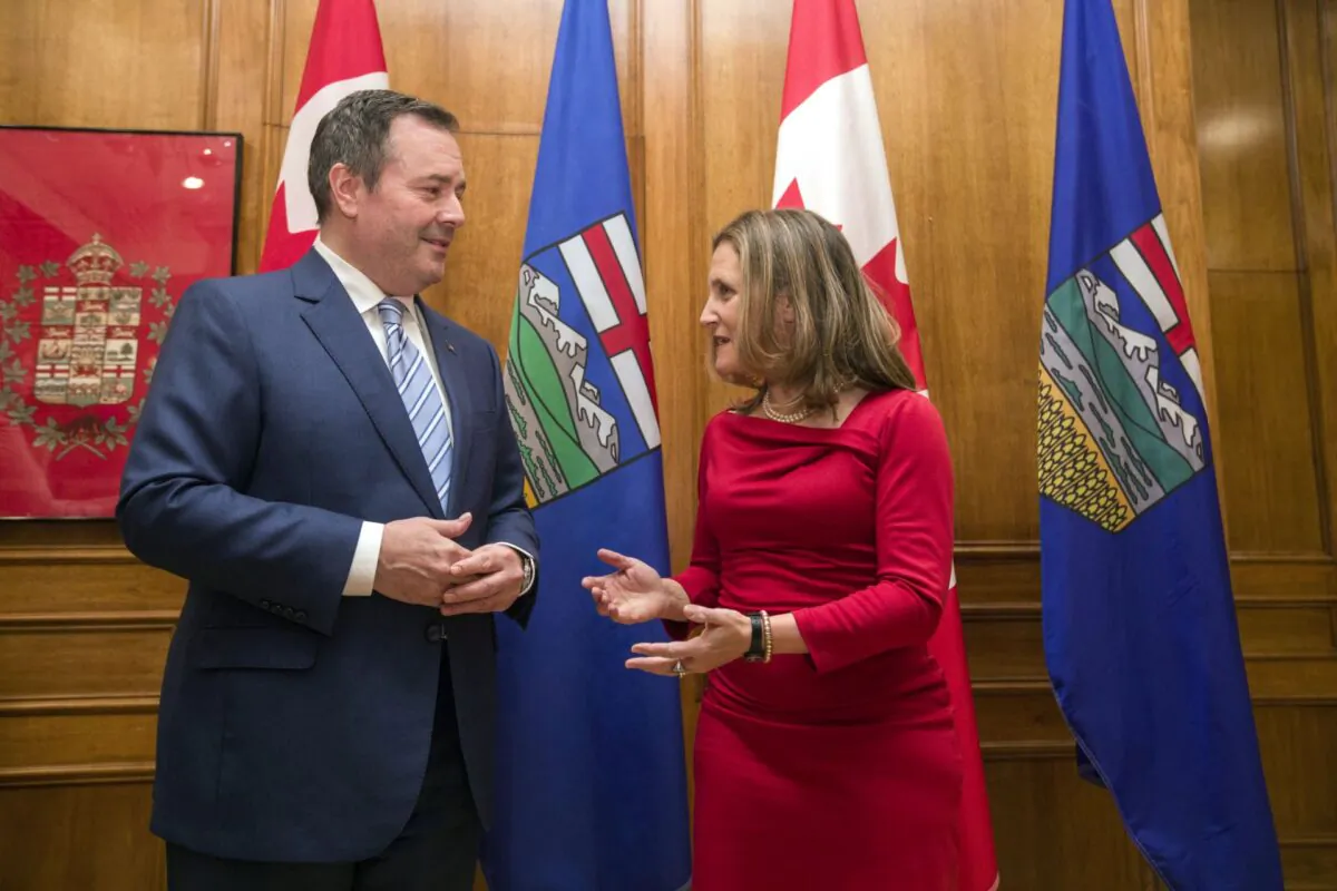 Deputy Prime Minister Chrystia Freeland and Alberta Premier Jason Kenney take part in a photo opportunity ahead of their meeting in Edmonton on Nov. 25, 2019. (The Canadian Press/Amber Bracken)
