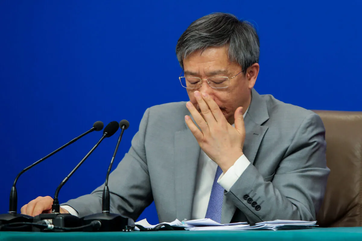 Yi Gang, the governor of Chinese central bank People's Bank of China, attends a press conference on the financial reform and development during the second session of the 13th National People's Congress (NPC) at media centre in Beijing on March 10, 2019. (Lintao Zhang/Getty Images)