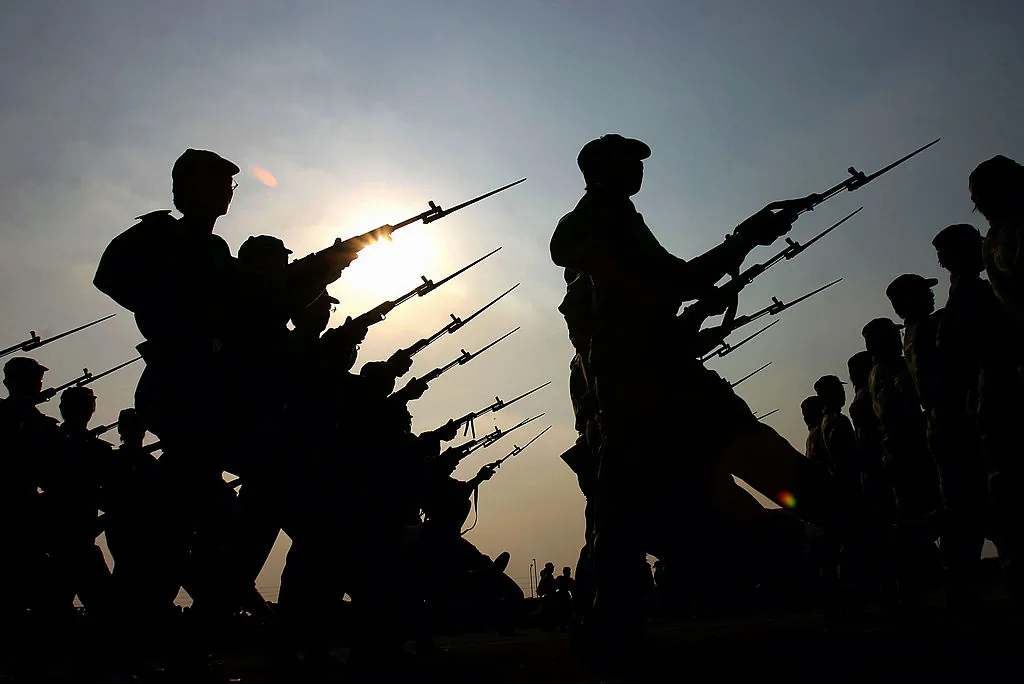 New army recruits march during military training at Guangzhou University in China's Guangdong Province, on Sept. 20, 2005. (China Photos/Getty Images)