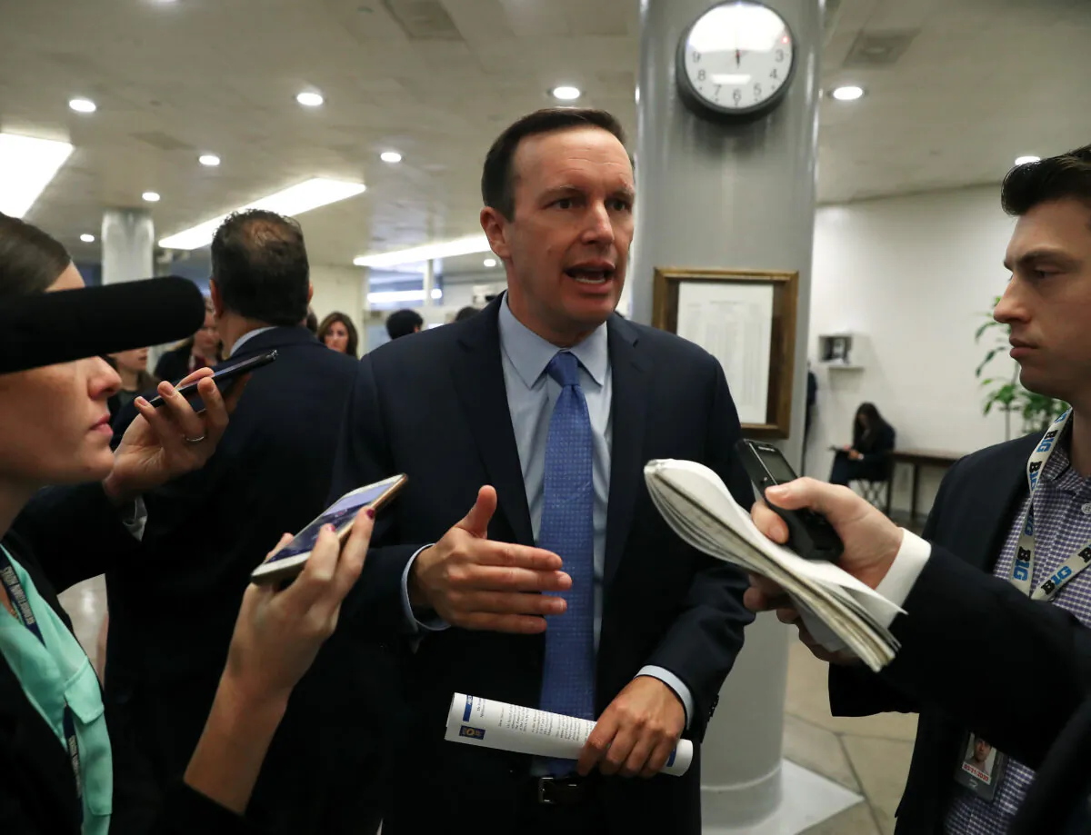 Sen. Chris Murphy (D-Conn.) talks to reporters ahead of a vote before attending the weekly Senate Democrat policy luncheon on Capitol Hill in Washington on Sept. 24, 2019. (Mark Wilson/Getty Images)
