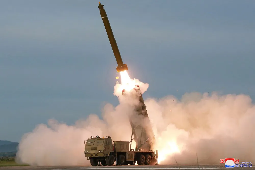 The test firing of an unspecified missile at an undisclosed location in North Korea on Aug. 24, 2019. (Korean Central News Agency/Korea News Service via AP)