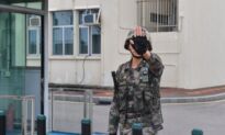 Chinese Colonel at Hong Kong Army Garrison Got Rank Through Bribery: Insider
