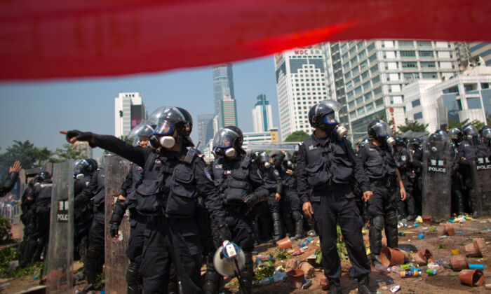 Riot police gather as anti-Japanese protesters demonstrate over the disputed Diaoyu Islands in Shenzhen of Guangdong province, China on September 16, 2012. (Lam Yik Fei/Getty Images)