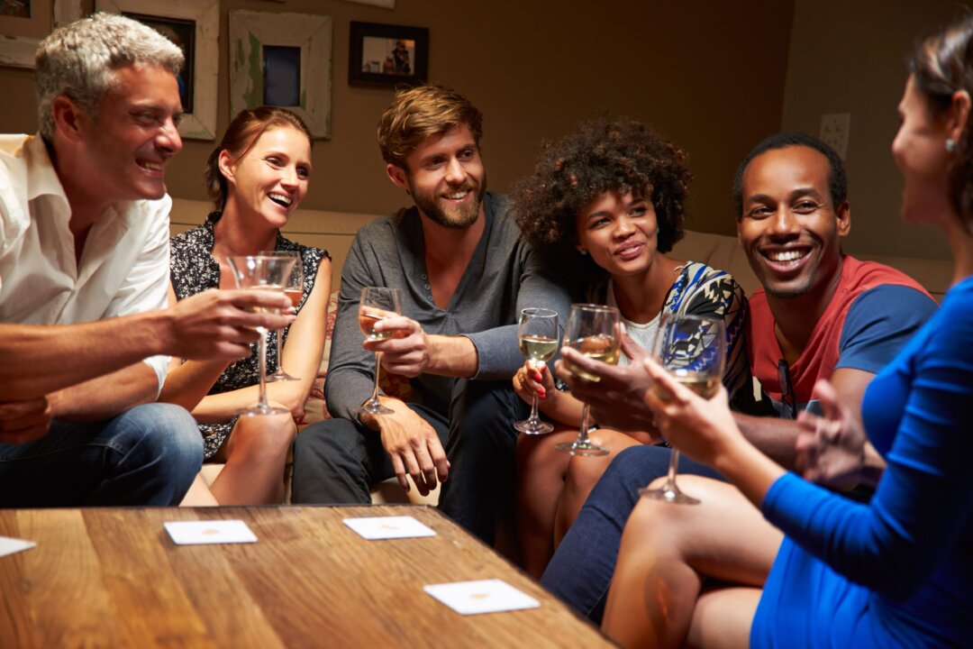 A night with friends is more than a pleasant way to pass time, it is an essential human need and a way to create a sense of belonging for yourself and others. (Monkey Business Image/Shutterstock)