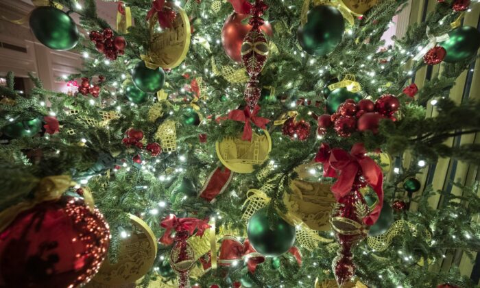 A tree in the State Dining Room is decorated during the 2019 Christmas preview at the White House, on Dec. 2, 2019. (Alex Brandon/AP Photo)