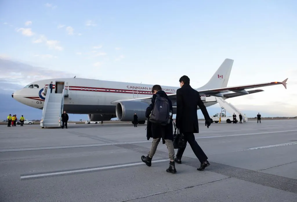 Prime Minister Justin Trudeau and son Xavier depart Ottawa on Dec. 2, 2019. Trudeau flies to London to celebrate the 70th birthday of the NATO military alliance, which is facing questions and uncertainty about how to deal with Russia, China, and its own internal divisions. (The Canadian Press/Sean Kilpatrick)