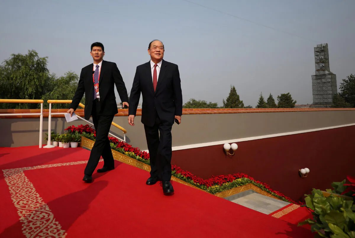 Macau Chief Executive Ho Iat Seng arrives before the military parade marking the 70th founding anniversary of China's Communist Party, on its National Day in Beijing on Oct. 1, 2019. (Sheng Jiapeng/CNS via Reuters)