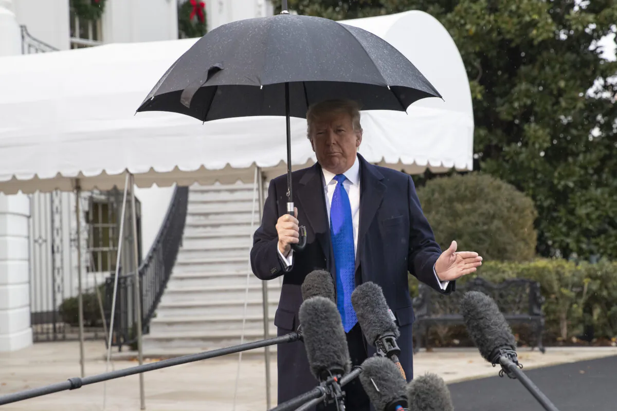 President Donald Trump speaks with reporters on the South Lawn of the White House in Washington before departing to NATO meetings in Europe, on Dec. 2, 2019. (Alex Brandon/AP Photo)