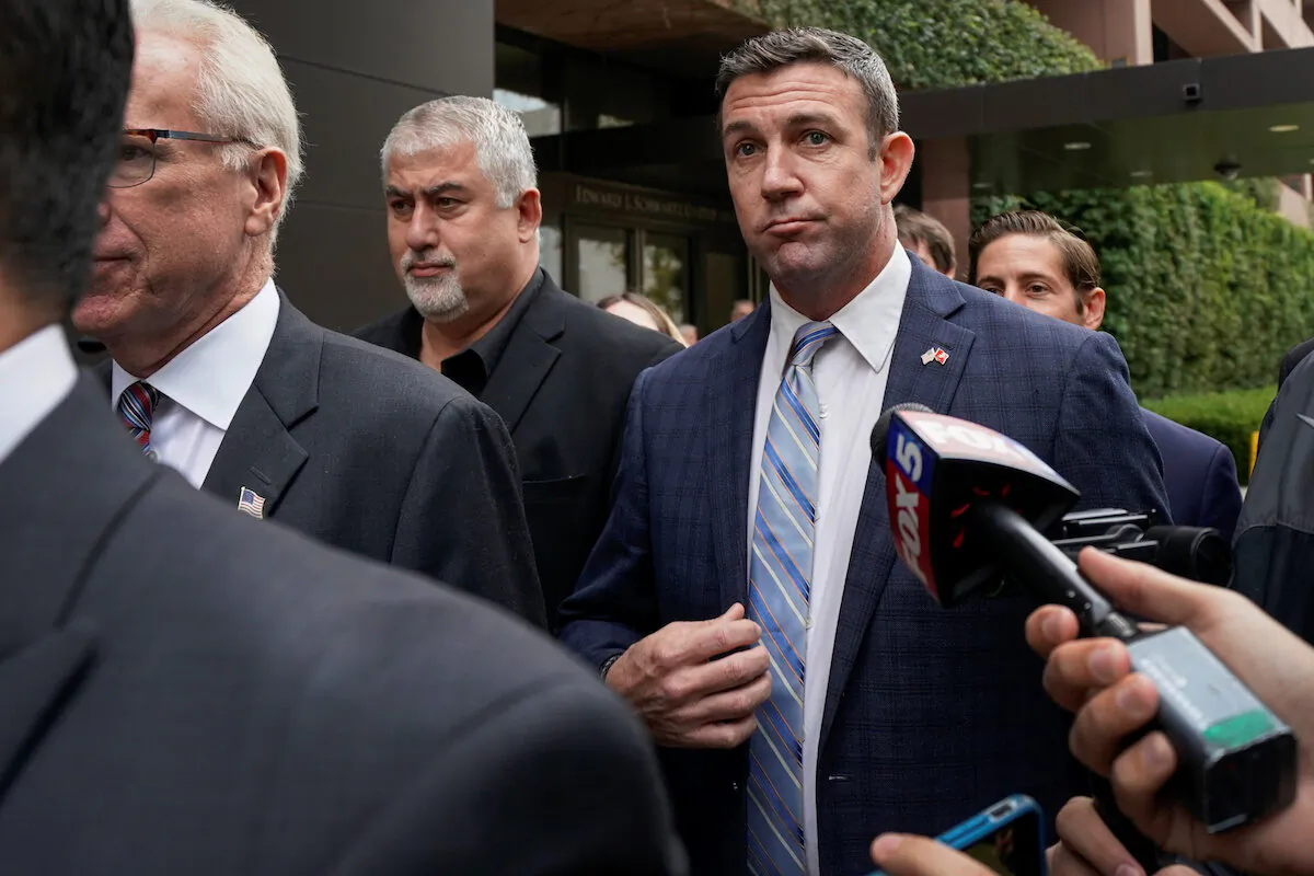Rep. Duncan Hunter (R-Calif.) leaves federal court after pleading guilty to misusing campaign funds, in San Diego, Calif., on Dec. 3, 2019. (Mike Blake/Reuters)