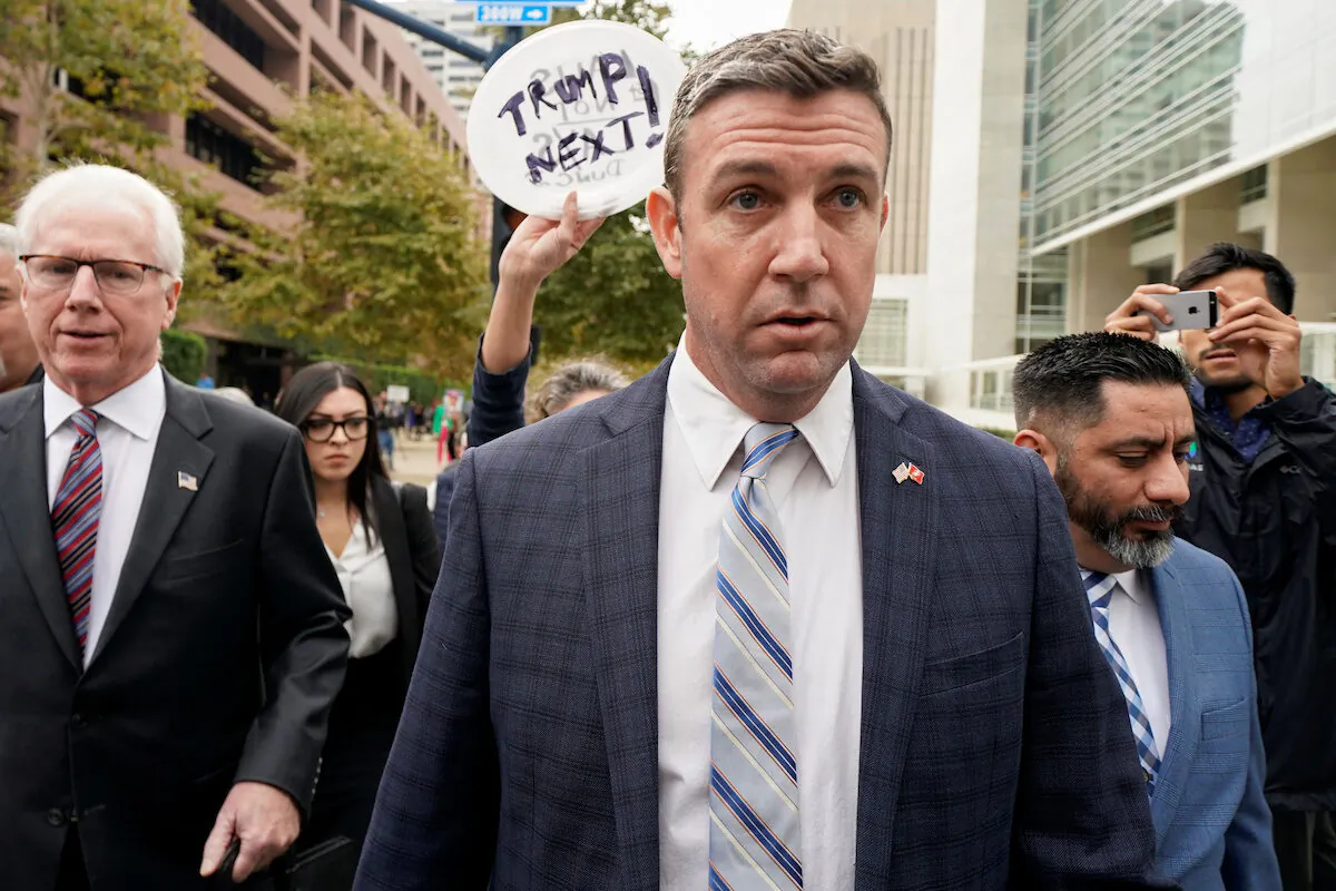 Rep. Duncan Hunter (R-Calif.) leaves federal court after pleading guilty to misusing campaign funds, in San Diego, Calif., on Dec. 3, 2019. (Mike Blake/Reuters)