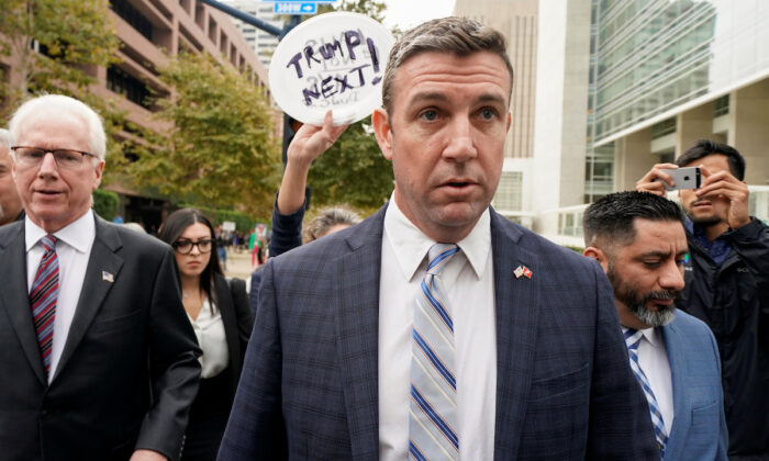 Rep. Duncan Hunter (R-Calif.) leaves federal court after pleading guilty to misusing campaign funds, in San Diego, Calif., on Dec. 3, 2019. (Mike Blake/Reuters)