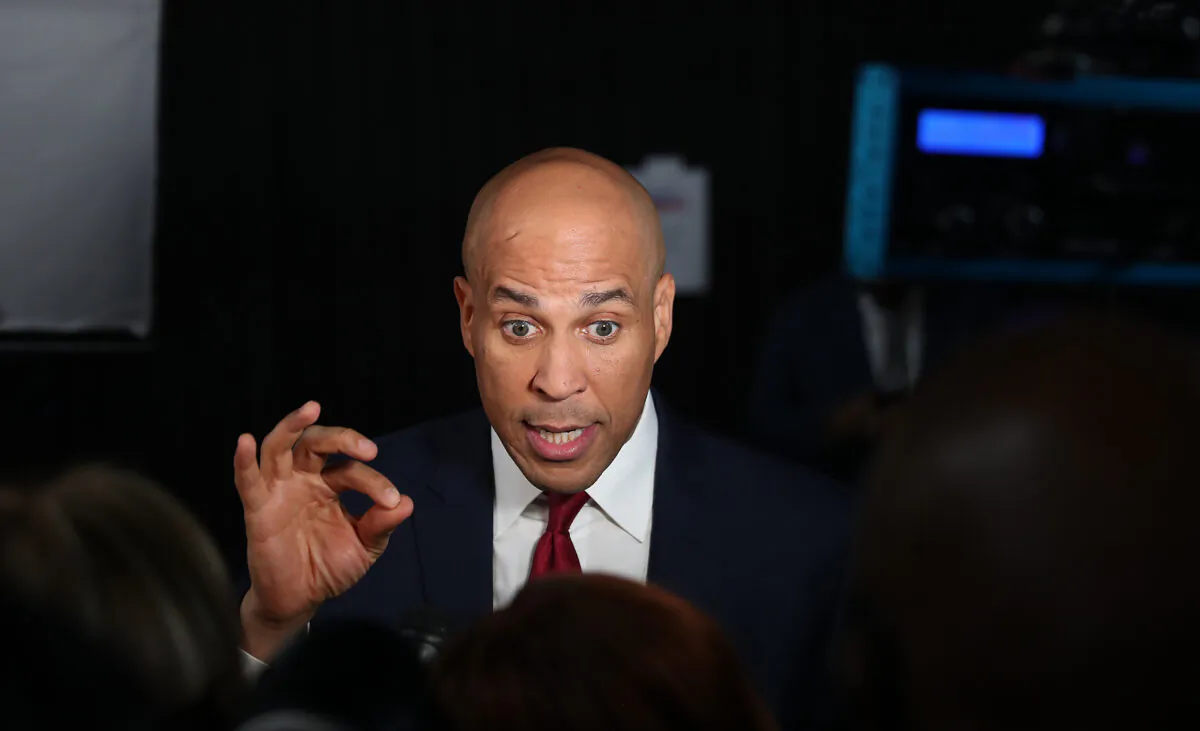 Sen. Cory Booker (D-N.J.) speaks during a television interview after the Democratic presidential debate at Tyler Perry Studios in Atlanta, Georgia on Nov. 20, 2019. (Joe Raedle/Getty Images)