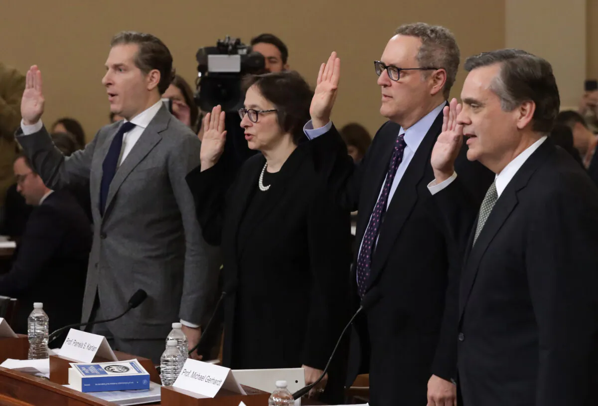 Constitutional scholars (L-R) Noah Feldman of Harvard University, Pamela Karlan of Stanford University, Michael Gerhardt of the University of North Carolina, and Jonathan Turley of George Washington University are sworn in prior to testifying before the House Judiciary Committee in the Longworth House Office Building on Capitol Hill in Washington on Dec. 4, 2019. Alex Wong/Getty Images