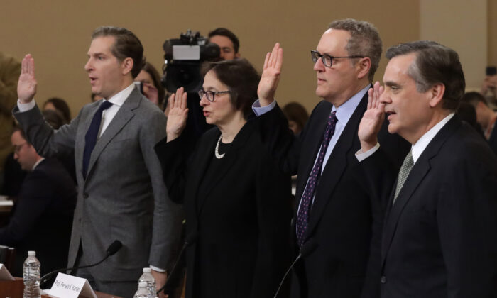 Constitutional scholars (L-R) Noah Feldman of Harvard University, Pamela Karlan of Stanford University, Michael Gerhardt of the University of North Carolina, and Jonathan Turley of George Washington University are sworn in prior to testifying before the House Judiciary Committee in the Longworth House Office Building on Capitol Hill in Washington on Dec. 4, 2019.  Alex Wong/Getty Images