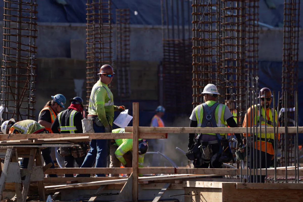 Work crews construct a new hotel complex on oceanfront property in Encinitas, Cali., on Nov. 26, 2019. (Mike Blake/Reuters)