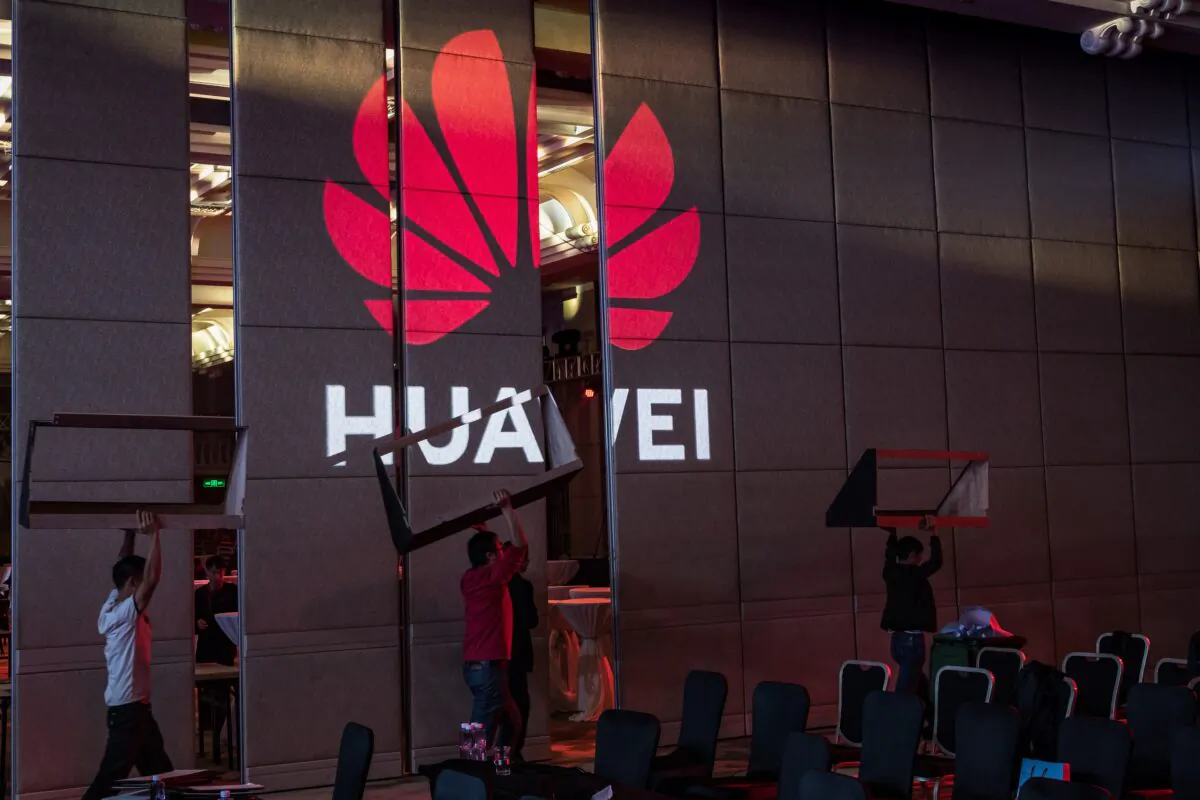 Workers prepare the venue for Huawei HAS2019 Global Analyst Summit in Shenzhen, China on April 16, 2019. (Billy H.C. Kwok/Getty Images)