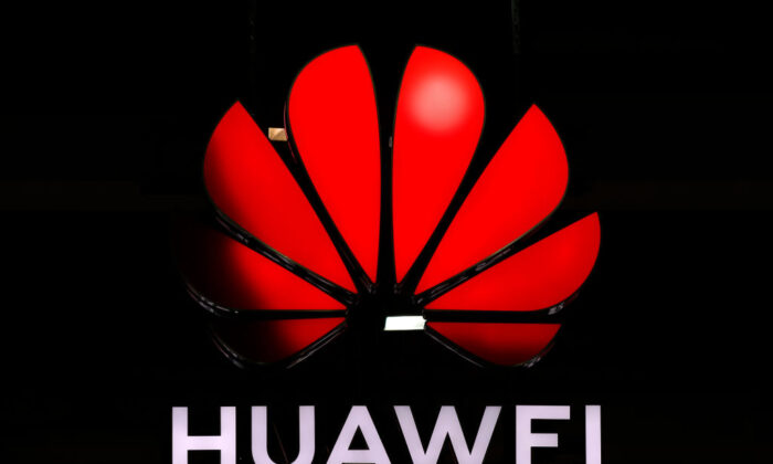 An illuminated Huawei sign is on display during an event in Zurich, Switzerland, on Oct. 15, 2019. (Stefan Wermuth/AFP via Getty Images)