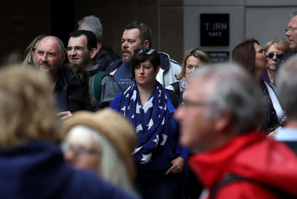 Pedestrians walk along Powell Street in San Francisco on May 14, 2019. (Justin Sullivan/Getty Images)