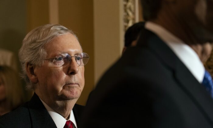 Senate Majority Leader Mitch McConnell (R-Ky.) listens during a press conference in Washington in a file photograph. (Alex Edelman/Getty Images)