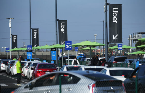 Uber vehicles line up