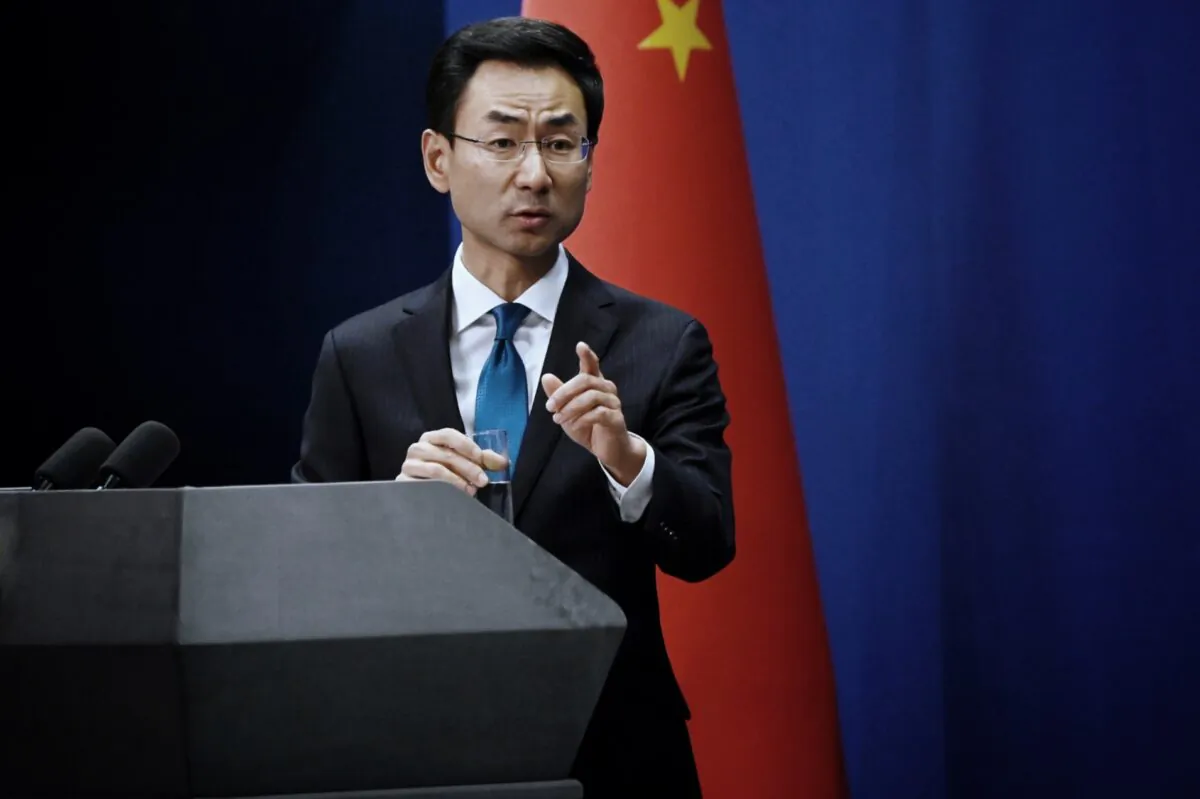 China's Ministry of Foreign Affairs spokesman Geng Shuang answers a question during a briefing in Beijing on November 28, 2019. - China's foreign ministry summoned the US ambassador on November 28, urging Washington to refrain from applying a bill supporting Hong Kong's pro-democracy movement to "avoid further damage" to relations. (Photo by WANG ZHAO/AFP via Getty Images)