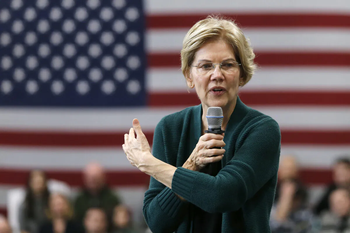 Democratic presidential candidate Sen. Elizabeth Warren (D-Mass.) gestures as she speaks during a campaign stop in Manchester, N.H., on Nov. 23, 2019. (Mary Schwalm/AP Photo)