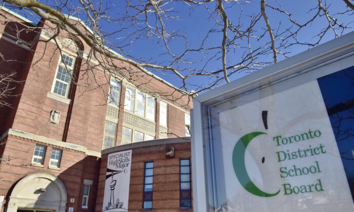 A Toronto District School Board sign is shown in front of a high school in Toronto on Jan. 30, 2018. (The Canadian Press/Frank Gunn)