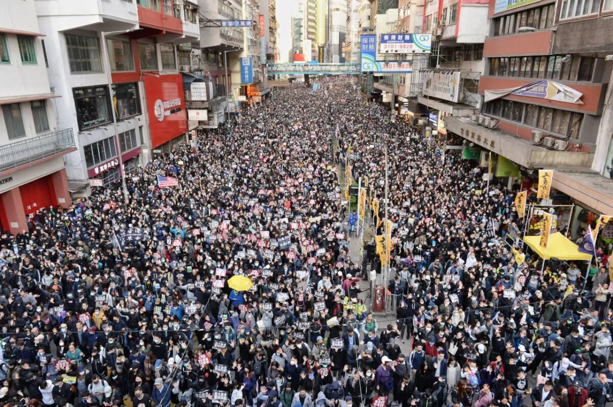 Tens of thousands of protesters march in the streets in Causeway Bay in Hong Kong on Dec. 8, 2019. (Sung Bi-lung/The Epoch Times)