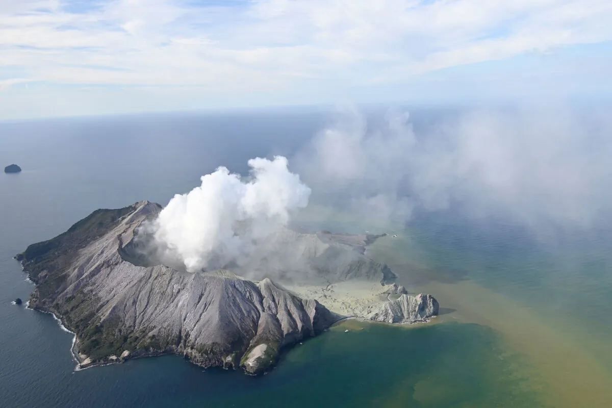 This aerial photo shows White Island after its volcanic eruption in New Zealand on Dec. 9, 2019. (George Novak/New Zealand Herald via AP)