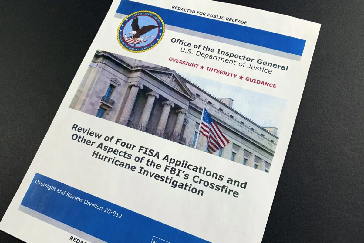 The cover page of the report issued by the Department of Justice inspector general in Washington, on Dec. 9, 2019. (Jon Elswick/AP Photo)