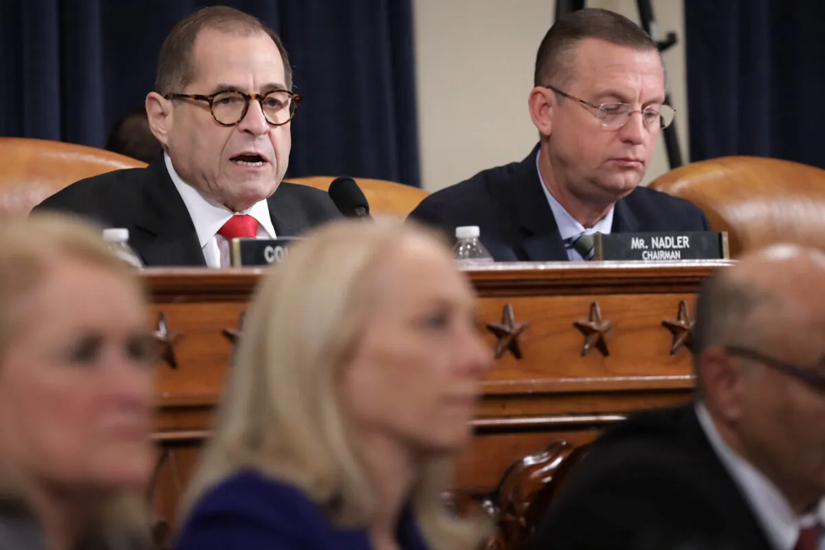House Judiciary Chairman Jerrold Nadler (D-N.Y.), left, and ranking member Rep. Doug Collins (R-Ga.) participate in a committee hearing on impeachment in the Longworth House Office Building on Capitol Hill in Washington on Dec. 9, 2019. (Alex Wong/Getty Images)