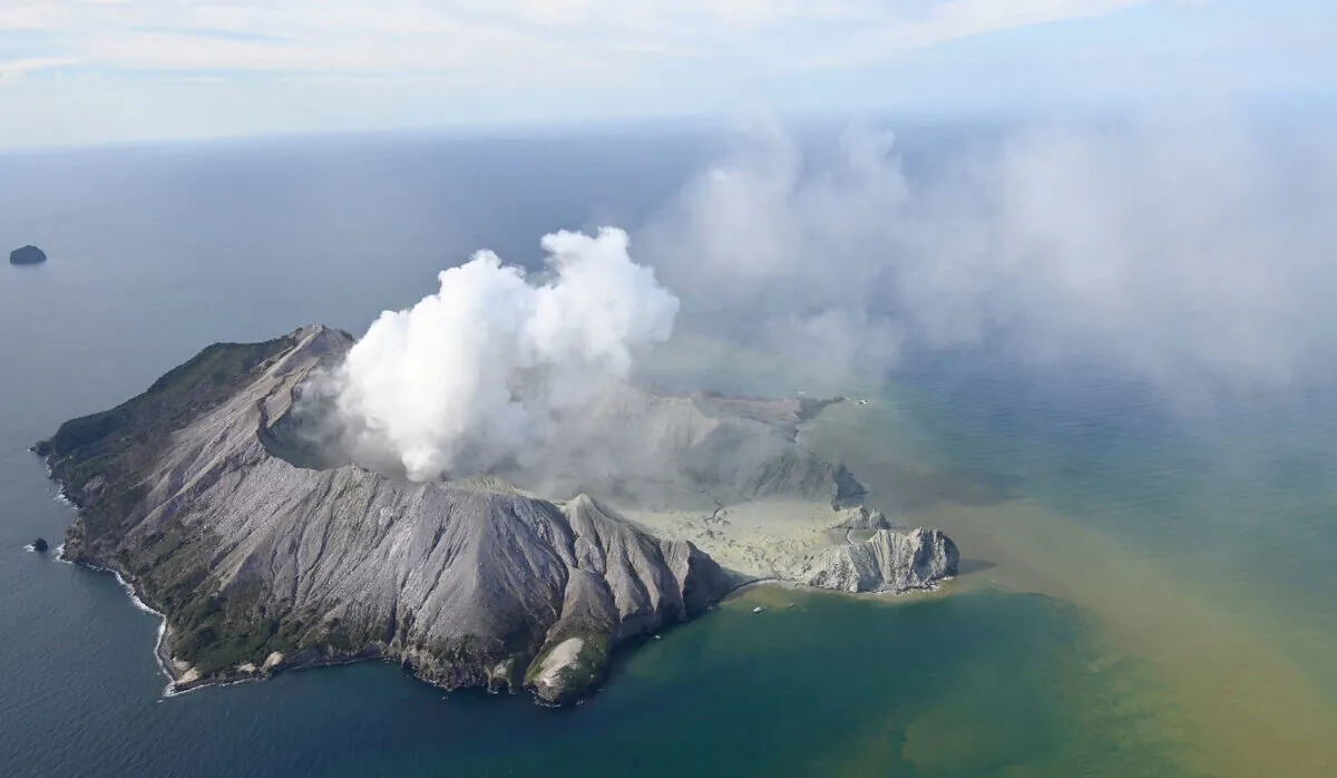 This aerial photo shows White Island after its volcanic eruption in New Zealand on Dec. 9, 2019. (George Novak/New Zealand Herald via AP)