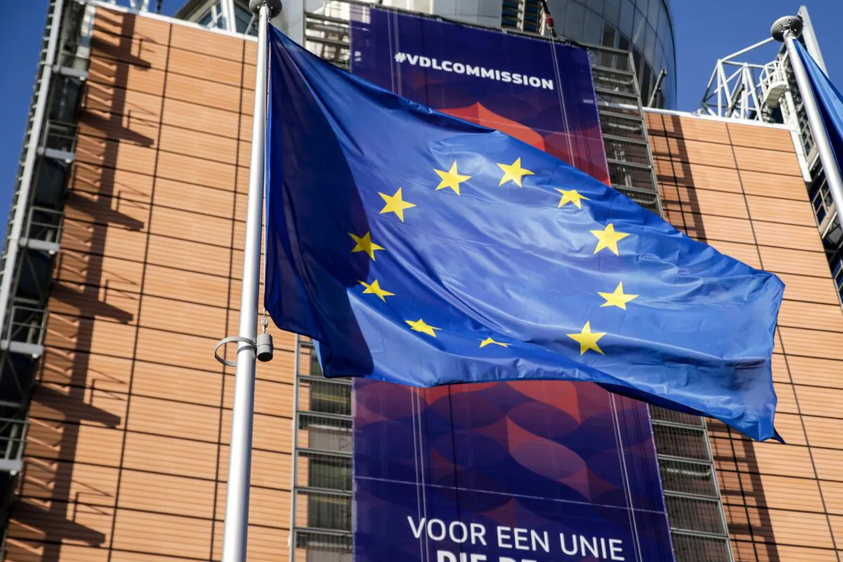A European Union flag flies in front of the European Commission headquarters in Brussels on Dec. 3, 2019. (Aris Oikonomou/AFP via Getty Images)