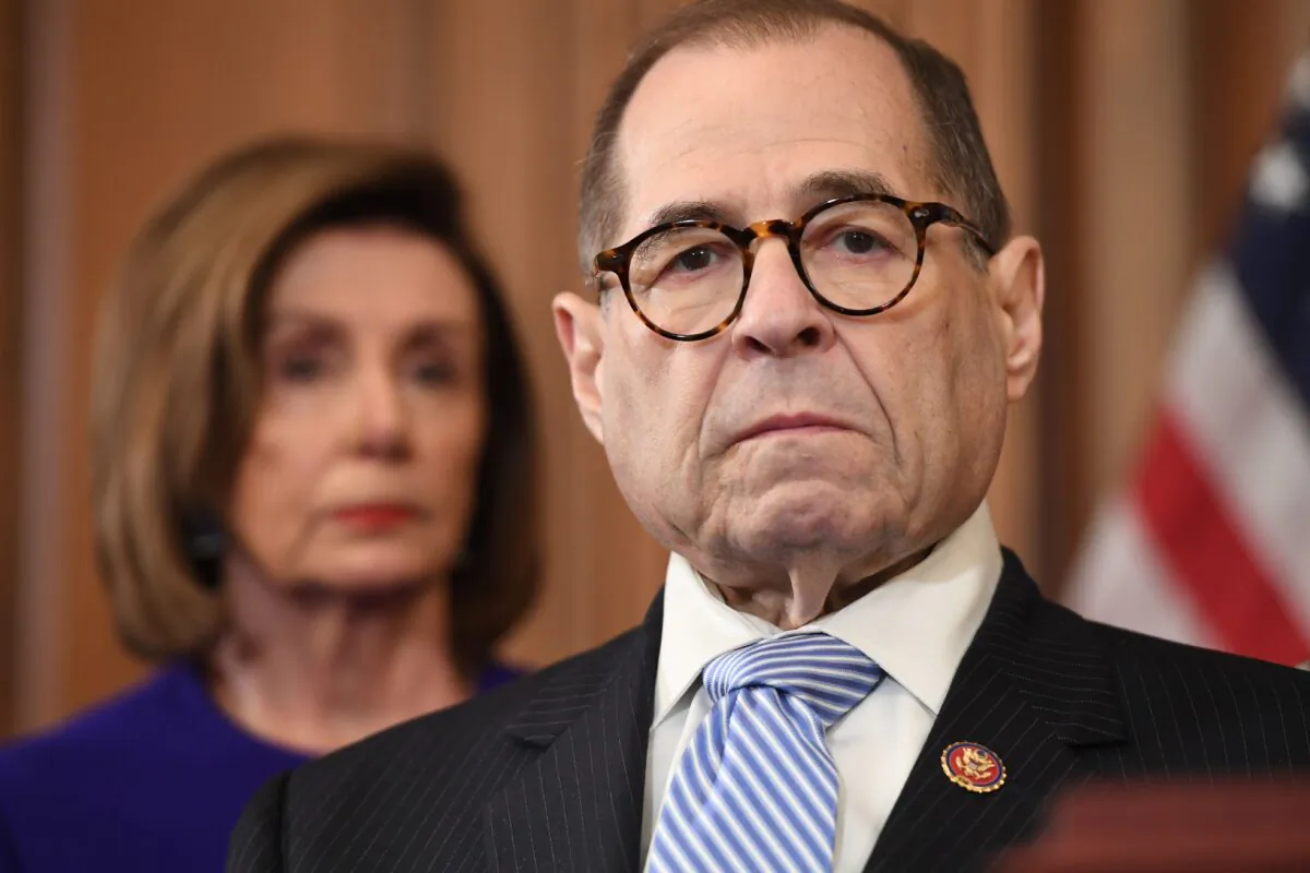 House Speaker Nancy Pelosi (D-Calif.) listens next to House Judiciary Chairman Jerry Nadler (D-N.Y.) during a press conference to announce articles of impeachment for President Donald Trump during a press conference at the U.S. Capitol in Washington on Dec. 10, 2019. (Saul Loeb/AFP via Getty Images)