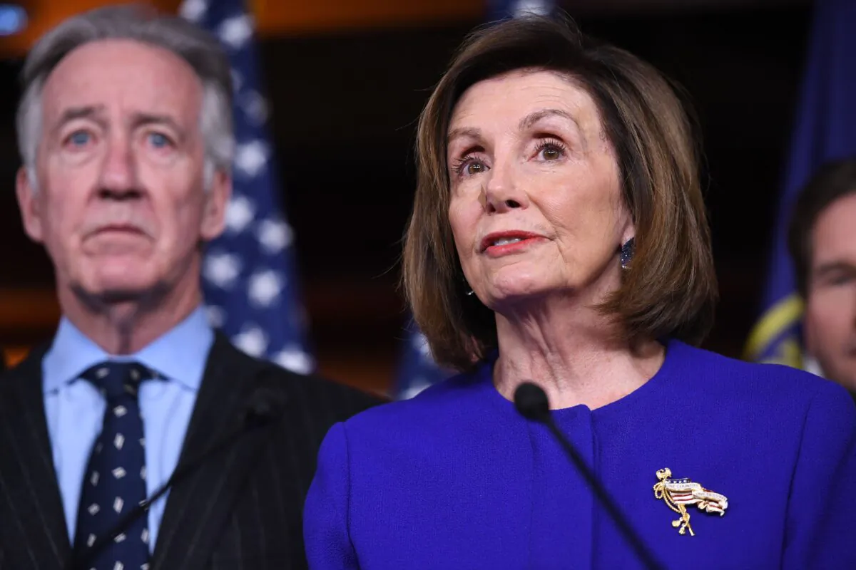 Speaker of the House Nancy Pelosi and House Ways and Means Committee Chairman Richard Neal speak about the USMCA trade deal on Dec. 10, 2019. (SAUL LOEB/AFP via Getty Images)