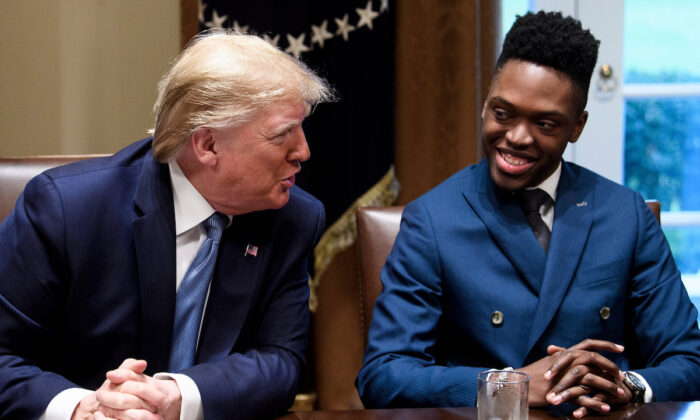 Walter Blanks listens as President Donald Trump participates in a roundtable discussion on empowering families with education choices at the White House in Washington on Dec. 9, 2019. (Brendan Smialowski/AFP via Getty Images)