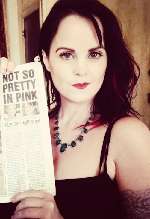 Collette McLafferty holding a copy of the New York Post newspaper at the Yellow Brick Collective in New York on Aug. 25, 2014. (Courtesy of Collette McLafferty)