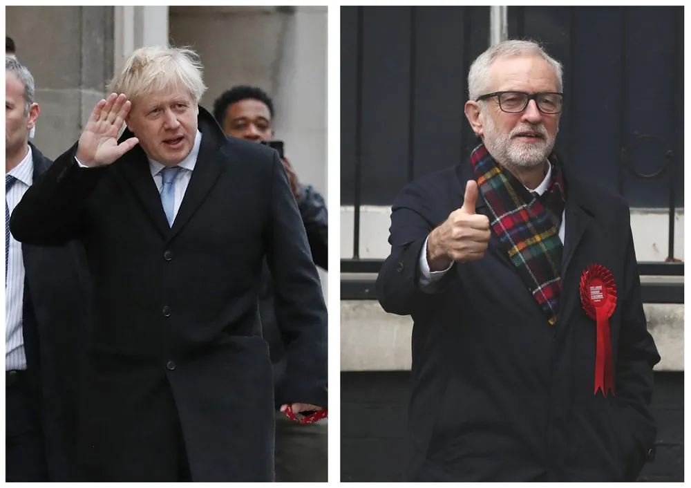 (L) Conservative Party leader Boris Johnson casts his vote at Methodist Central Hall in the Westminster area of London on Dec. 12, 2019, and (R) Britain's Labour Party leader Jeremy Corbyn casts his vote in the Islington area of London on Dec. 12, 2019. (Frank Augstein, Thanassis Stavrakis/AP Photo)