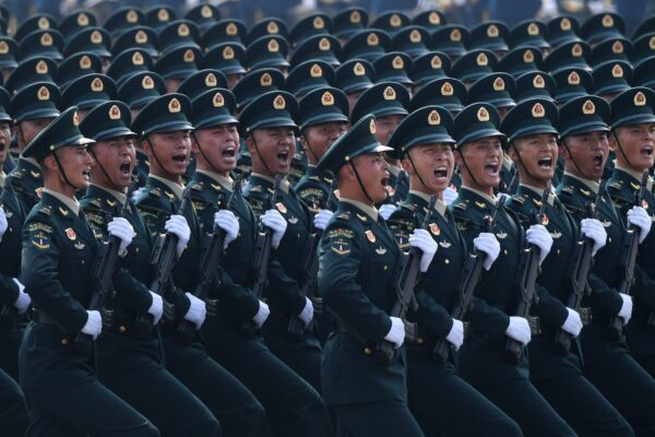 Chinese troops march during a military parade