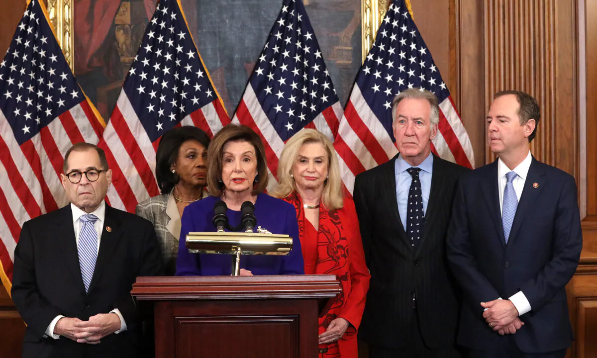 Speaker of the House Rep. Nancy Pelosi (D-Calif.) (C) speaks as (L-R) Chairman of House Judiciary Committee Rep. Jerry Nadler (D-N.Y.), Chairwoman of House Financial Services Committee Rep. Maxine Waters (D-Calif.), Chairwoman of House Oversight and Reform Committee Rep. Carolyn Maloney (D-N.Y.) and Chairman of House Ways and Means Committee Rep. Richard Neal (D-MA) listen during a news conference at the U.S. Capitol in Washington, DC, on Dec. 10, 2019. Chairman Nadler announced that the Judiciary Committee is introducing two articles on abuse of power and obstruction of Congress for the next steps in the House impeachment inquiry against President Trump. Alex Wong/Getty Images
