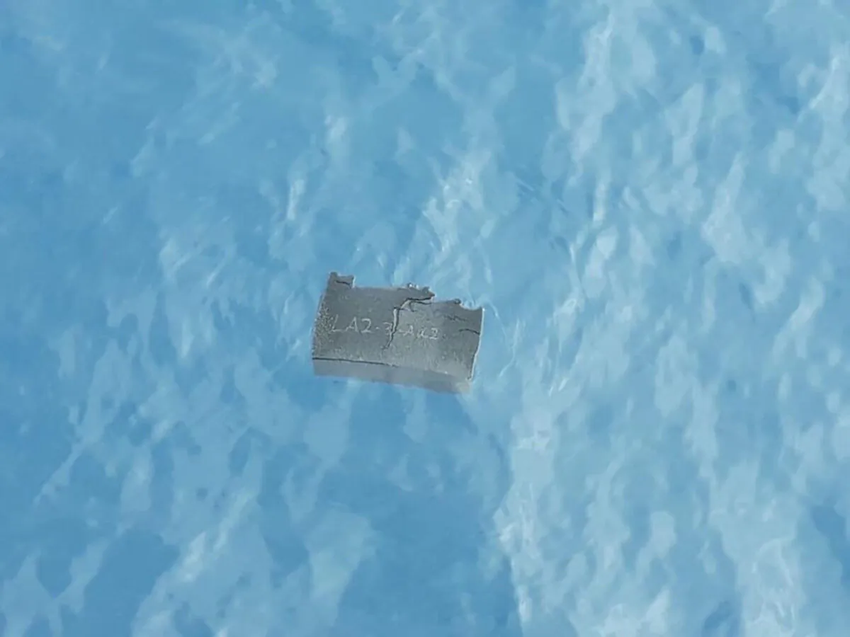 Debris believed by the Chilean Air Force to be from a Hercules C-130 military cargo plane that crashed this week and went missing, is seen in the Drake Passage or Sea of Hoces, Mid-Sea in this undated handout received on Dec. 11, 2019. (Chilean Air Force/via Reuters)