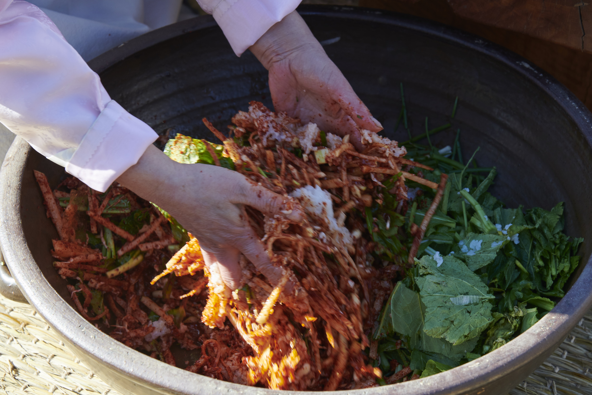 mixing kimchi paste by hand