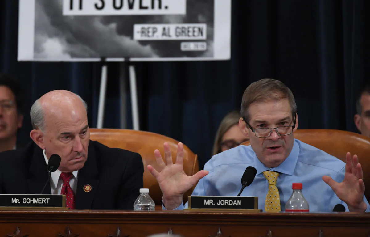 Rep. Louie Gohmert (R-Texas), left, looks on as Rep. Jim Jordan (R-Ohio), right, speaks during a House Judiciary Committee markup of Articles of Impeachment against President Donald Trump at the Longworth House Office Building in Washington on Dec. 12, 2019. (Matt McClain/Pool/Getty Images)