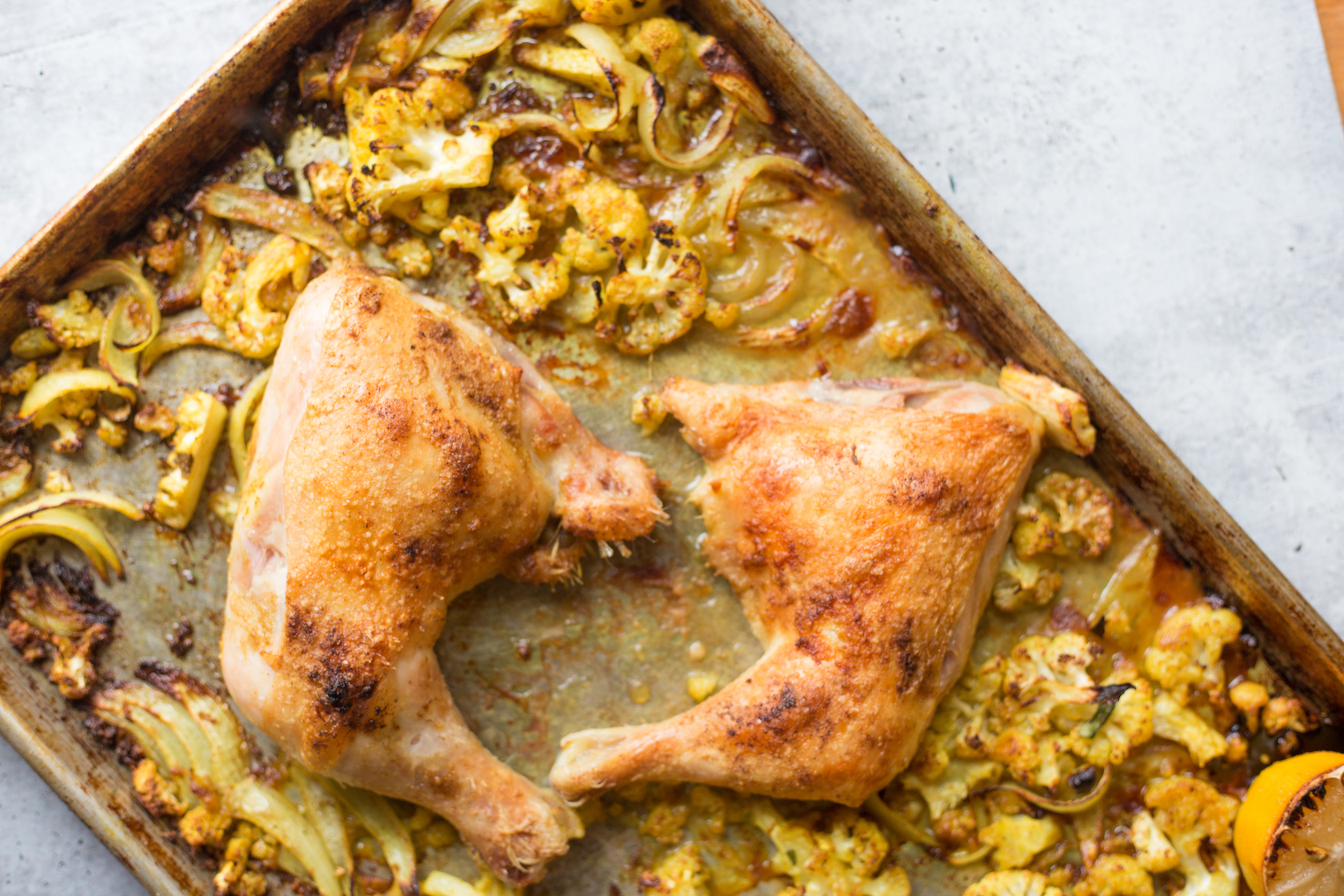 roasted chicken thighs on a sheet pan
