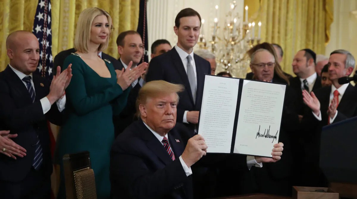 U.S. President Donald Trump signed an executive order to combat anti-Semitism during a Hanukkah Reception in the East Room of the White House on Dec. 11, 2019 in Washington, DC. (Mark Wilson/Getty Images)