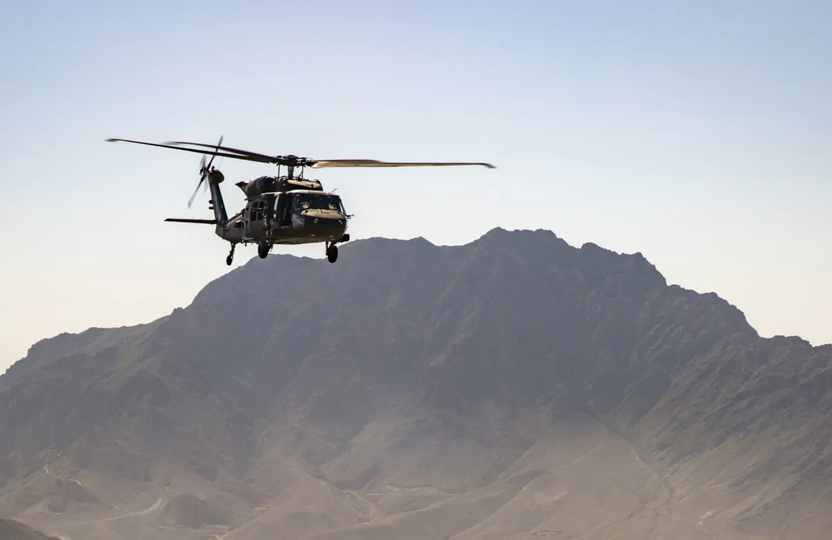 A UH-60 Black Hawk helicopter from Task Force Heavy Cav flies over Afghanistan in support of the 48th Infantry Brigade Combat Team during Operation Freedom's Sentinel and NATO Operation Resolute Support on May 20, 2019. (Jordan Trent/DoD)